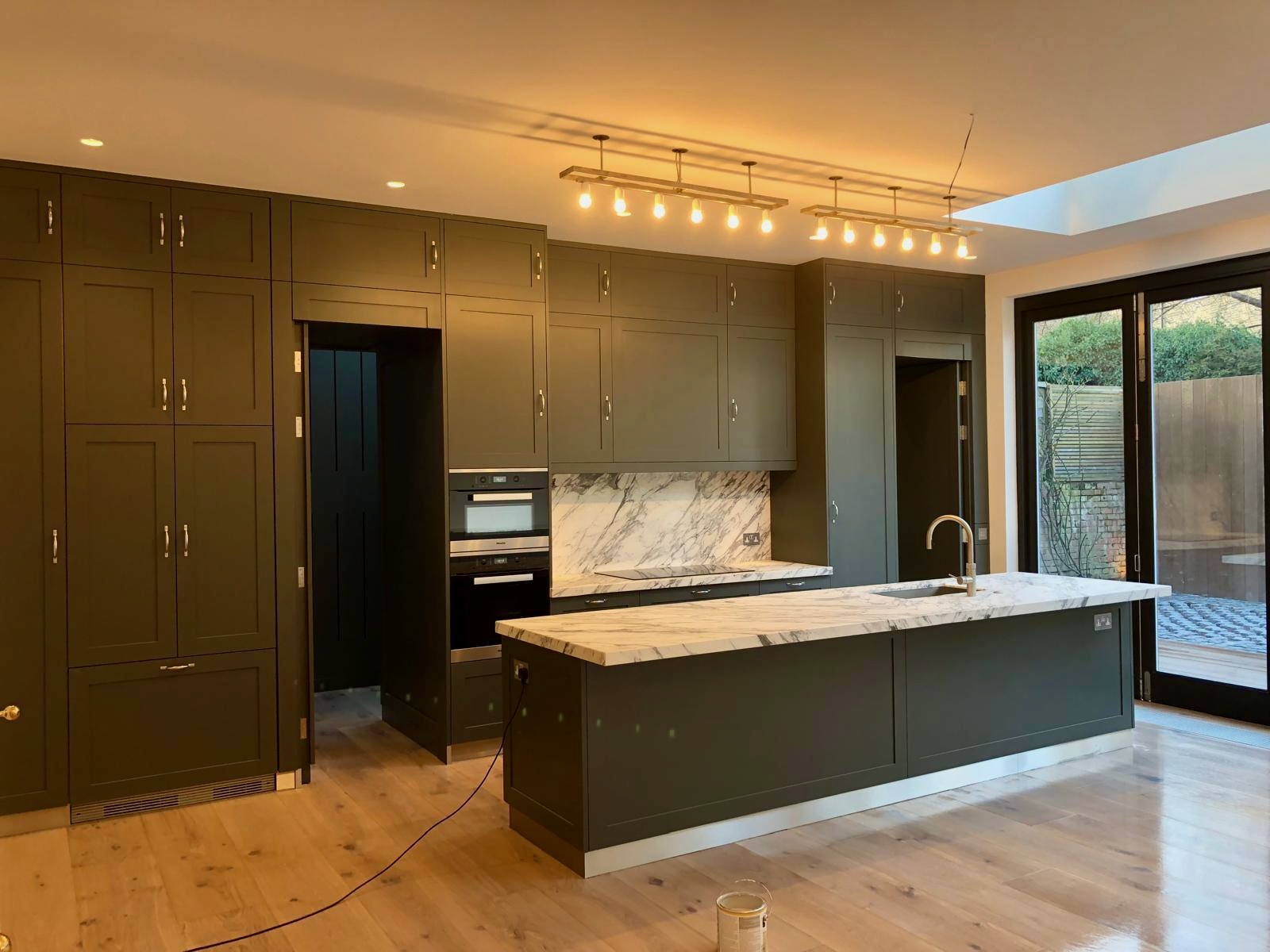 Modern kitchen renovation in London by Papillon Builds